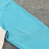 Chandal Marsella Celeste 2024-2025 hombro