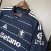 camiseta-aston-villa-tercera-equipacion-2024-2025-puño-izquierdo
