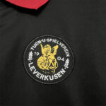 camiseta-bayer-leverkusen-120-aniversario-negro-2024-2025-escudo