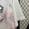 camiseta-lille-segunda-equipacion-2024-2025-puño-izquierdo