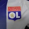 camiseta-lyon-primera-equipacion-version-jugador-2024-2025-escudo