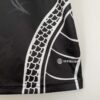 camiseta-real-madrid-edicion-especial-dragon-negro-2023-2024-pretina