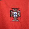 conjunto-niño-portugal-primera-equipacion-2025-2026-escudo