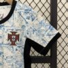 conjunto-niño-portugal-segunda-equipacion-2024-puño-izquierdo