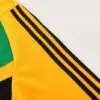 chandal-arsenal-verde-2024-2025-hombro