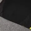 chandal-borussia-dortmund-2024-2025-pretina-parte-trasera