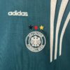 conjunto-niño-alemania-primera-equipacion-1996-1997-escudo