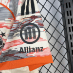 camiseta-bayern-munich-segunda-equipacion-2025-2026-puño