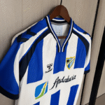 camiseta-malaga-primera-equipacion-2025-2026-dorsal
