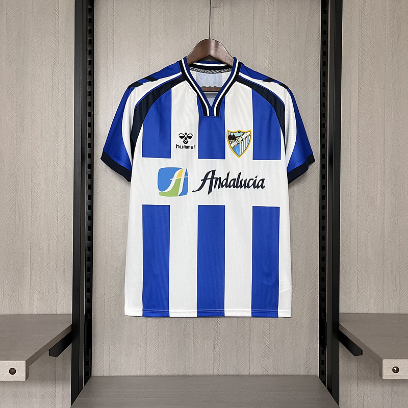 camiseta-malaga-primera-equipacion-2025-2026 camiseta-malaga-primera-equipacion-2025-2026