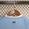 conjunto-niño-manchester-city-primera-equipacion-2025-2026-dorsal-trasero