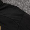 chandal-ac-milan-negro-2024-2025-hombro
