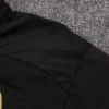 chandal-ac-milan-negro-2024-2025-hombro