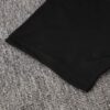 conjunto-de-entrenamiento-ac-milan-negro-2024-2025-puño