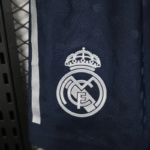 pantalon-corto-real-madrid-segunda-equipacion-2025-2026-escudo