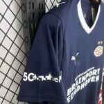 Camiseta PSV Eindhoven Segunda Equipación 2025-2026-hombro lateral.