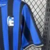 camiseta-atalanta-primera-equipacion-2025-2026-puño