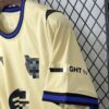 camiseta-fc-barcelona-segunda-equipacion-2025-2026-puño