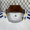 camiseta-leeds-united-primera-equipacion-2025-2026-cuello