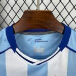 camiseta-malaga-primera-equipacion-2025-2026-cuello