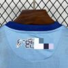 camiseta-malaga-primera-equipacion-2025-2026-cuello-trasero