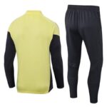 chandal-real-madrid-amarillo-negro-2025-2026-parte-trasera