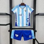conjunto-niño-malaga-primera-equipacion-2025-2026