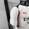 camiseta-ac-milan-segunda-equipacion-version-jugador-manga-larga-2025-2026-puño