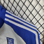 chaqueta-cortaviento-grecia-2025-2026-hombro