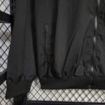 chaqueta-cortaviento-manchester-united-1-2025-2026-puño