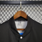 chaqueta-cortaviento-manchester-united-2025-2026-cuello