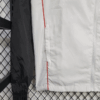 chaqueta-cortaviento-manchester-united-2025-2026-puño
