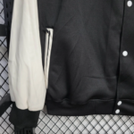 chaqueta-cortaviento-manchester-united-2025-2026-puño