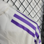 chaqueta-cortaviento-real-madrid-2025-2026-hombro