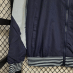 chaqueta-cortaviento-tottenham-2025-2026-puño