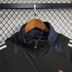 cortaviento-newcastle-2025-2026-cuello