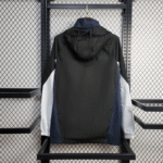 cortaviento-newcastle-2025-2026-parte-trasera