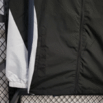 cortaviento-newcastle-2025-2026-puño