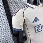 camiseta-ajax-segunda-equipacion-version-jugador-2025-2026-puño