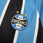 camiseta-gremio-primera-equipacion-2025-2026-escudo