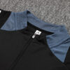 chandal-manchester-united-negro-gris-2024-2025-cuello
