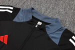 chandal-manchester-united-negro-gris-2024-2025-cuello