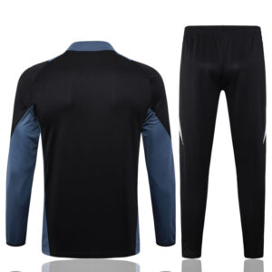 chandal-manchester-united-negro-gris-2024-2025-parte-trasera