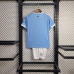 conjunto-niño-manchester-city-primera-equipacion-2025-2026-parte-trasera