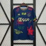 camiseta-ajax-bob-marley-edicion-especial-azul-2025-2026