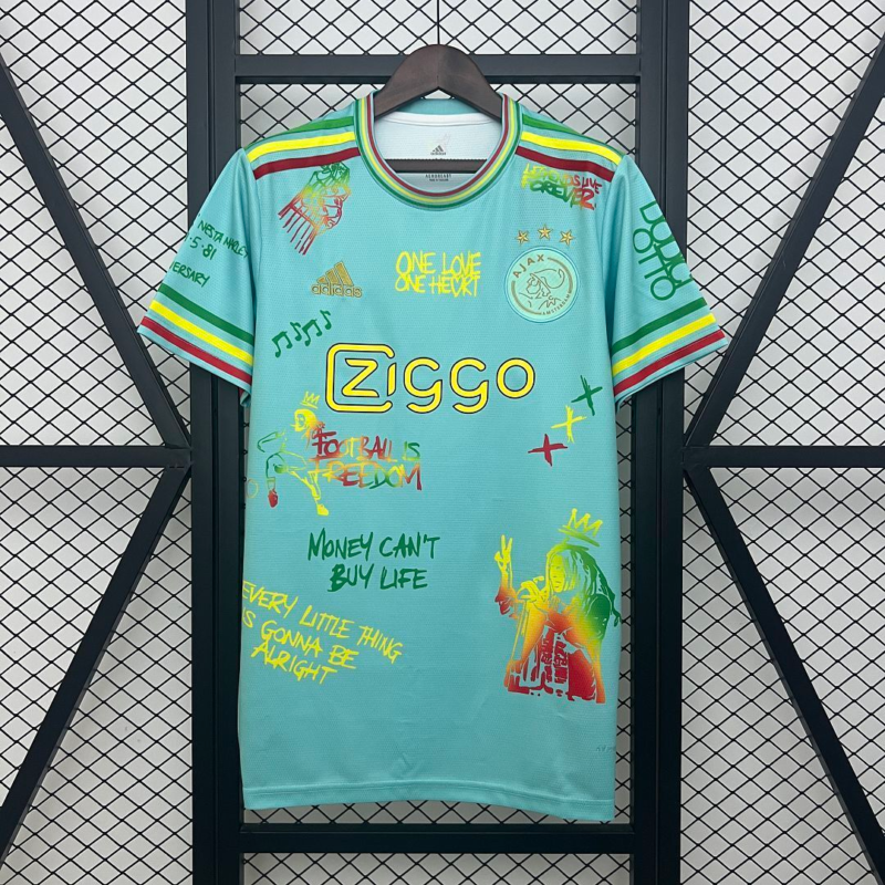 camiseta-ajax-bob-marley-edicion-especial-celeste-2025-2026 camiseta-ajax-bob-marley-edicion-especial-celeste-2025-2026