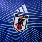 camiseta-japon-primera-equipacion-2025-2026-escudo