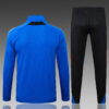 chandal-manchester-united-cremallera-azul-2025-2026-parche-trasero