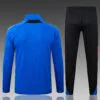 chandal-manchester-united-cremallera-azul-2025-2026-parche-trasero