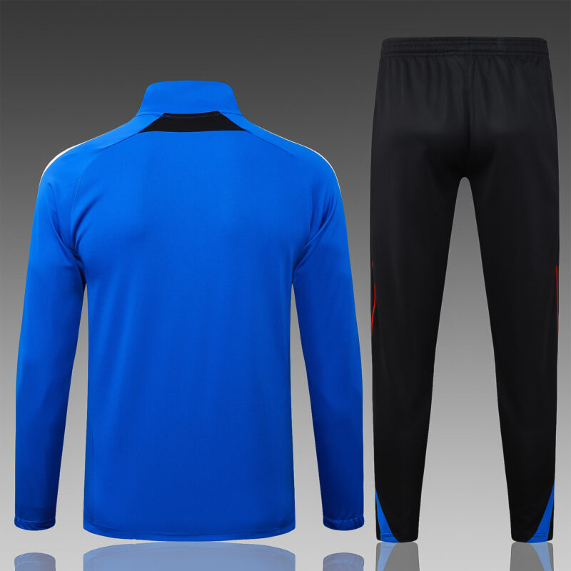 chandal-manchester-united-cremallera-azul-2025-2026-parche-trasero
